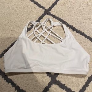 NEVER WORN WHITE SPORTS BRA SIZE L !!